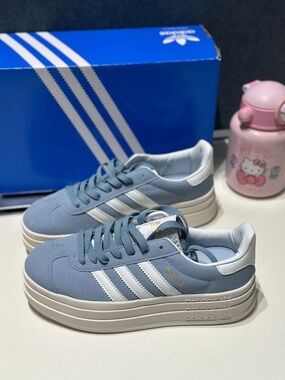 adidas Women’s Light Blue Platform Sneakers with White Stripes